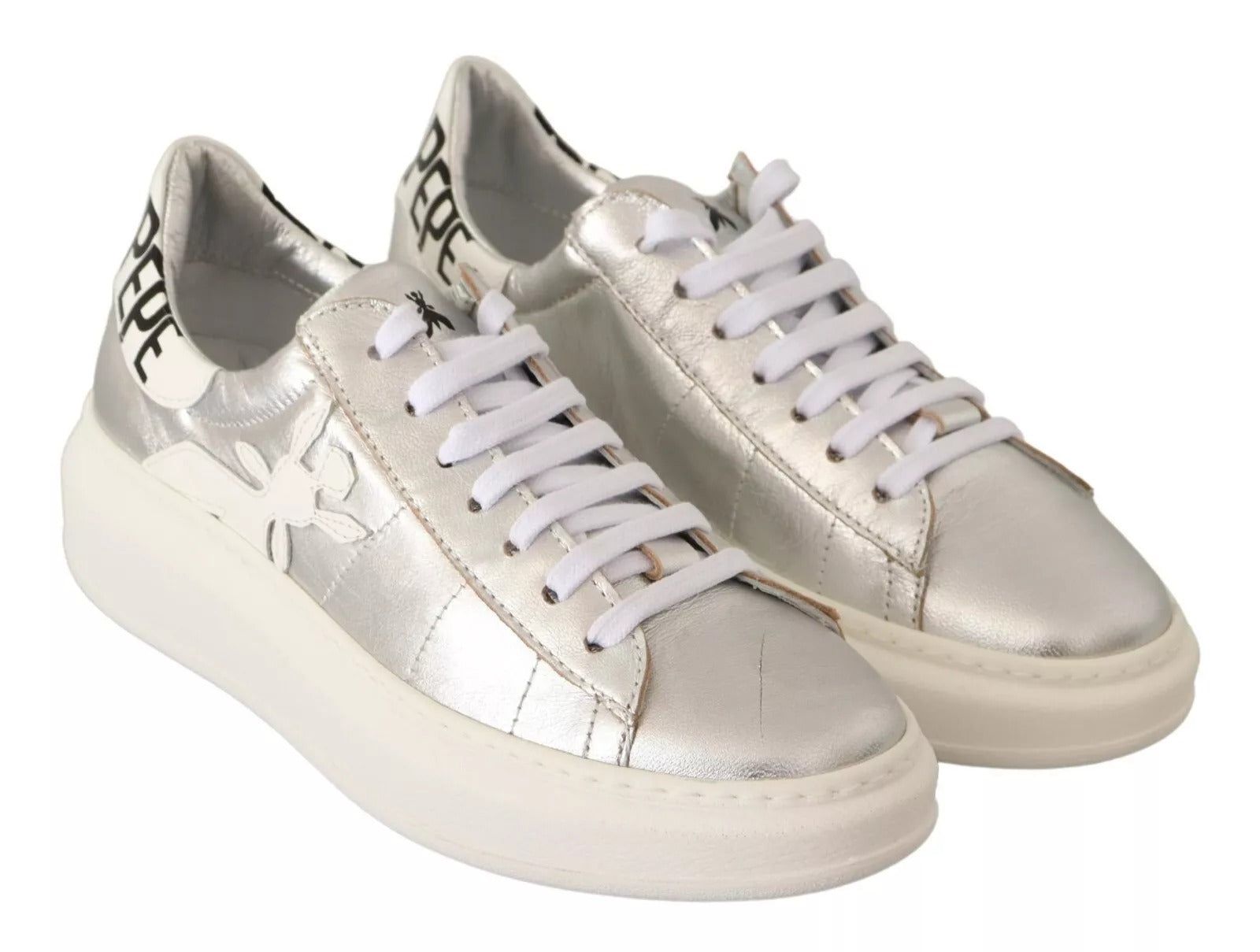 Silver glittery sneakers with white laces