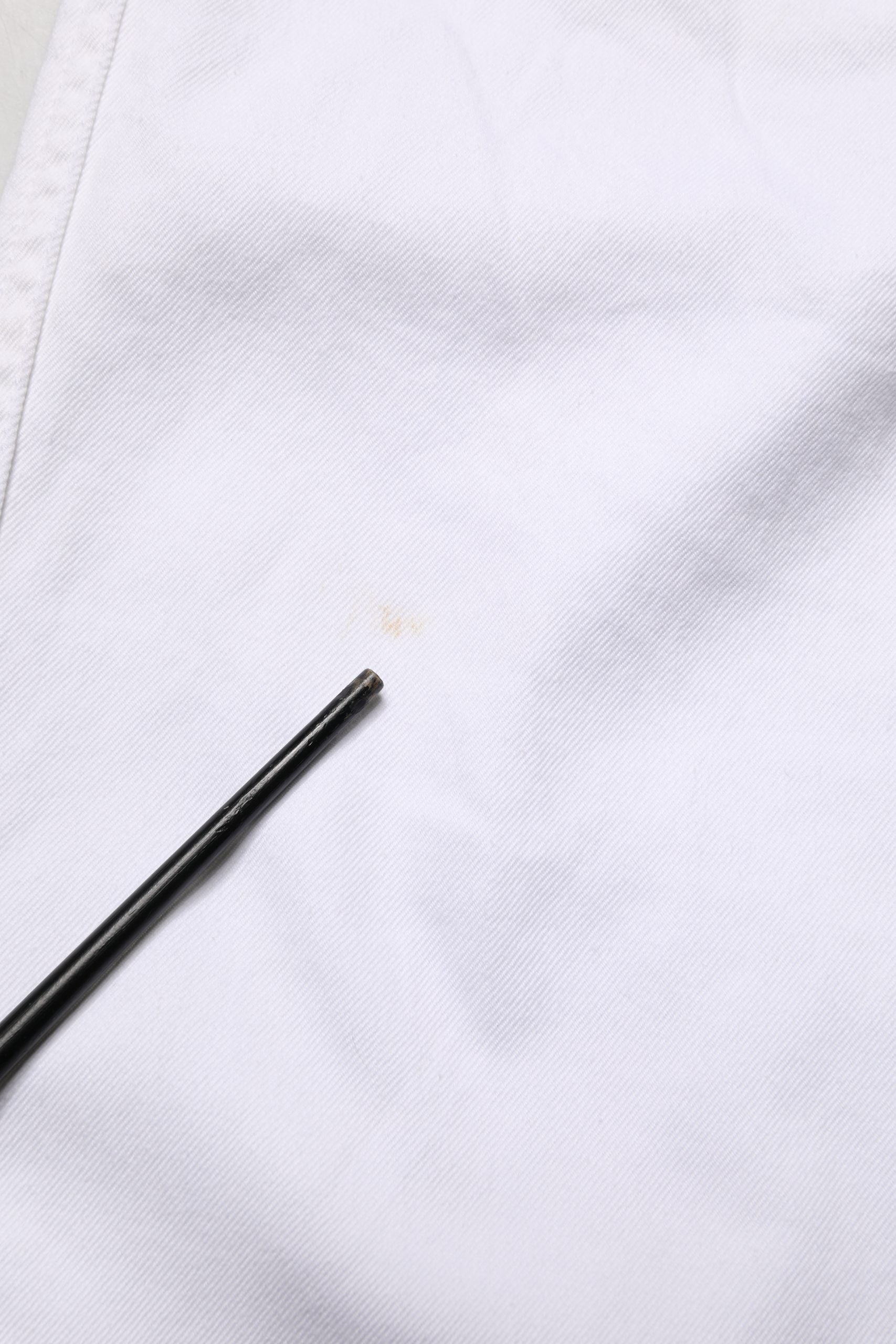 Black pen on white cloth