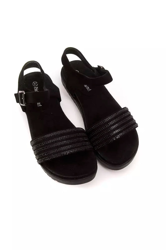 Pair of black high heel shoes with straps and buckles