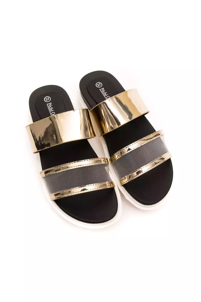 Pair of black and gold sandals with multiple straps