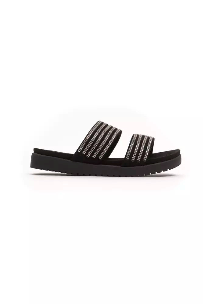 Black sandals with multiple straps and embellishments