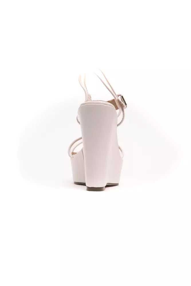 White high heel shoes with ankle straps and a small heel