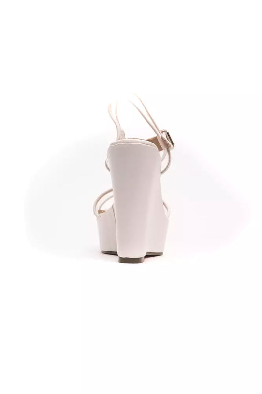 White high heel shoes with ankle straps and a small heel