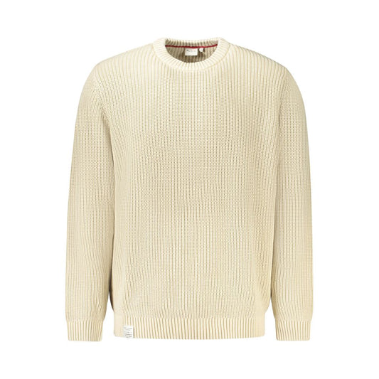 Tan knit sweater on hanger