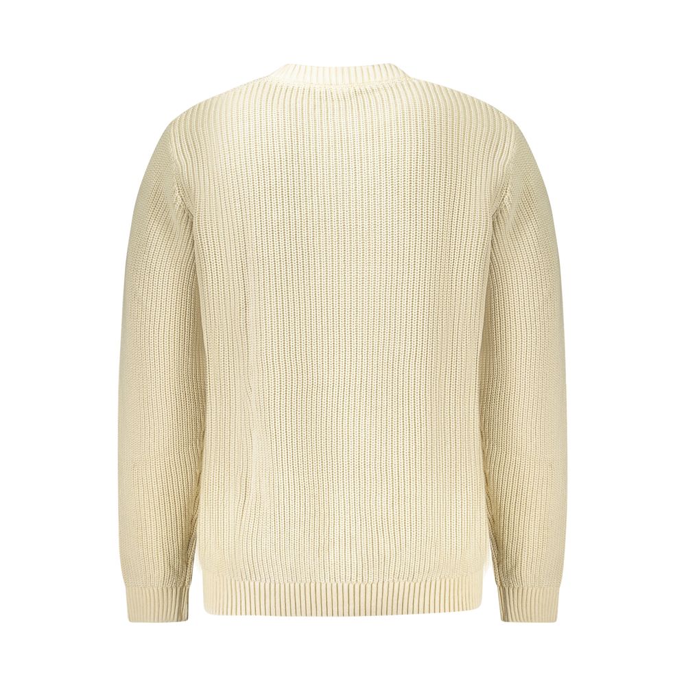 Yellow knit sweater on a mannequin