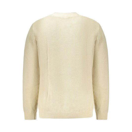 Yellow knit sweater on a mannequin