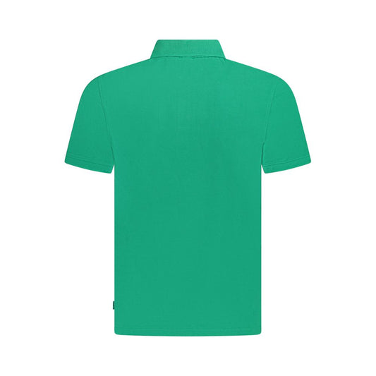 Green polo shirt on hanger