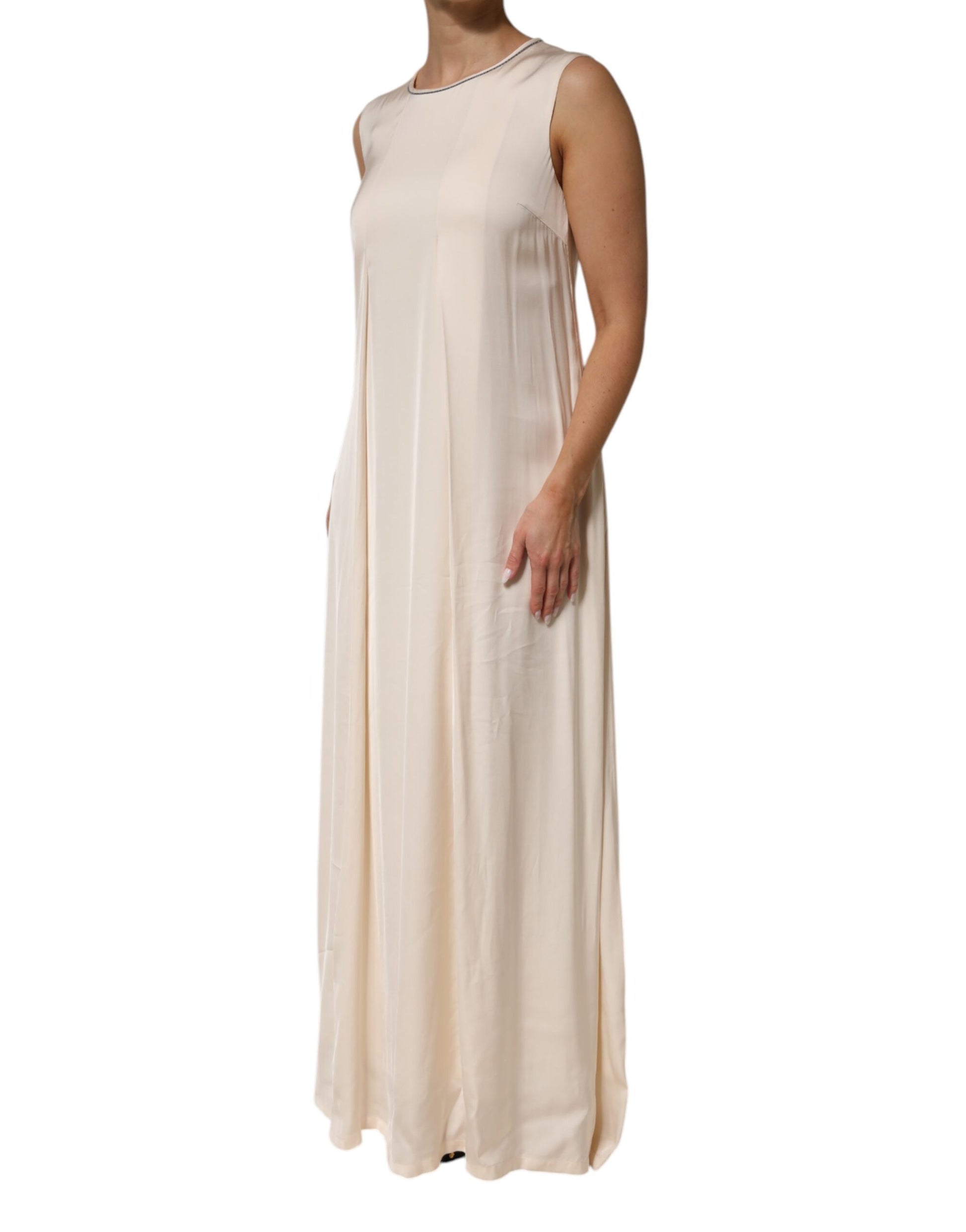 A long beige viscose dress with pleats and a sleeveless design