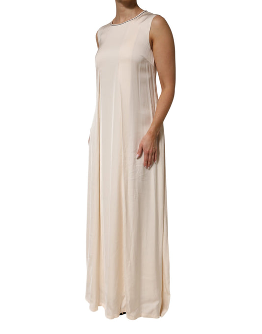 A long beige viscose dress with pleats and a sleeveless design