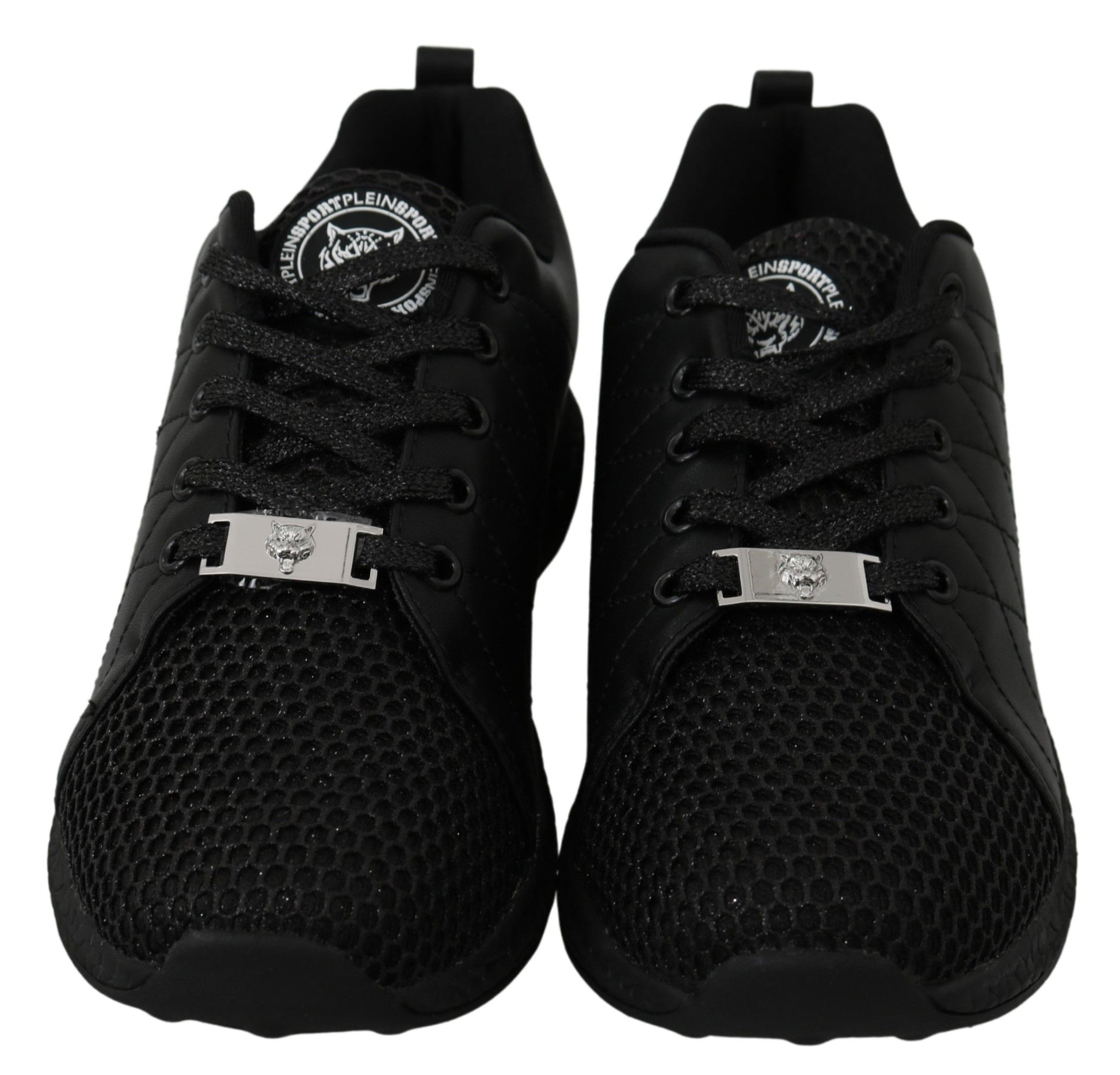 Pair of black sneakers with a silver buckle on the side