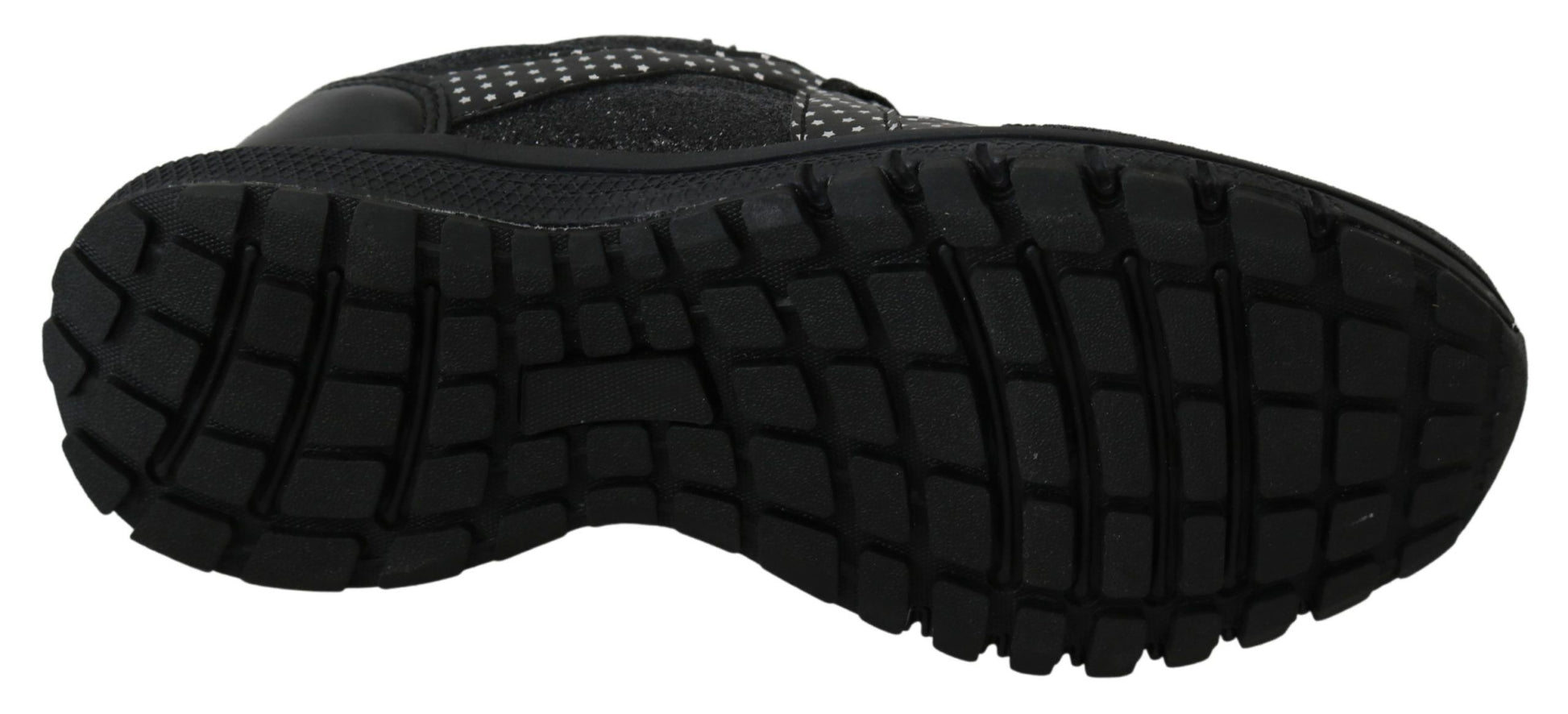 Pair of black hiking boots with deep treads and laces