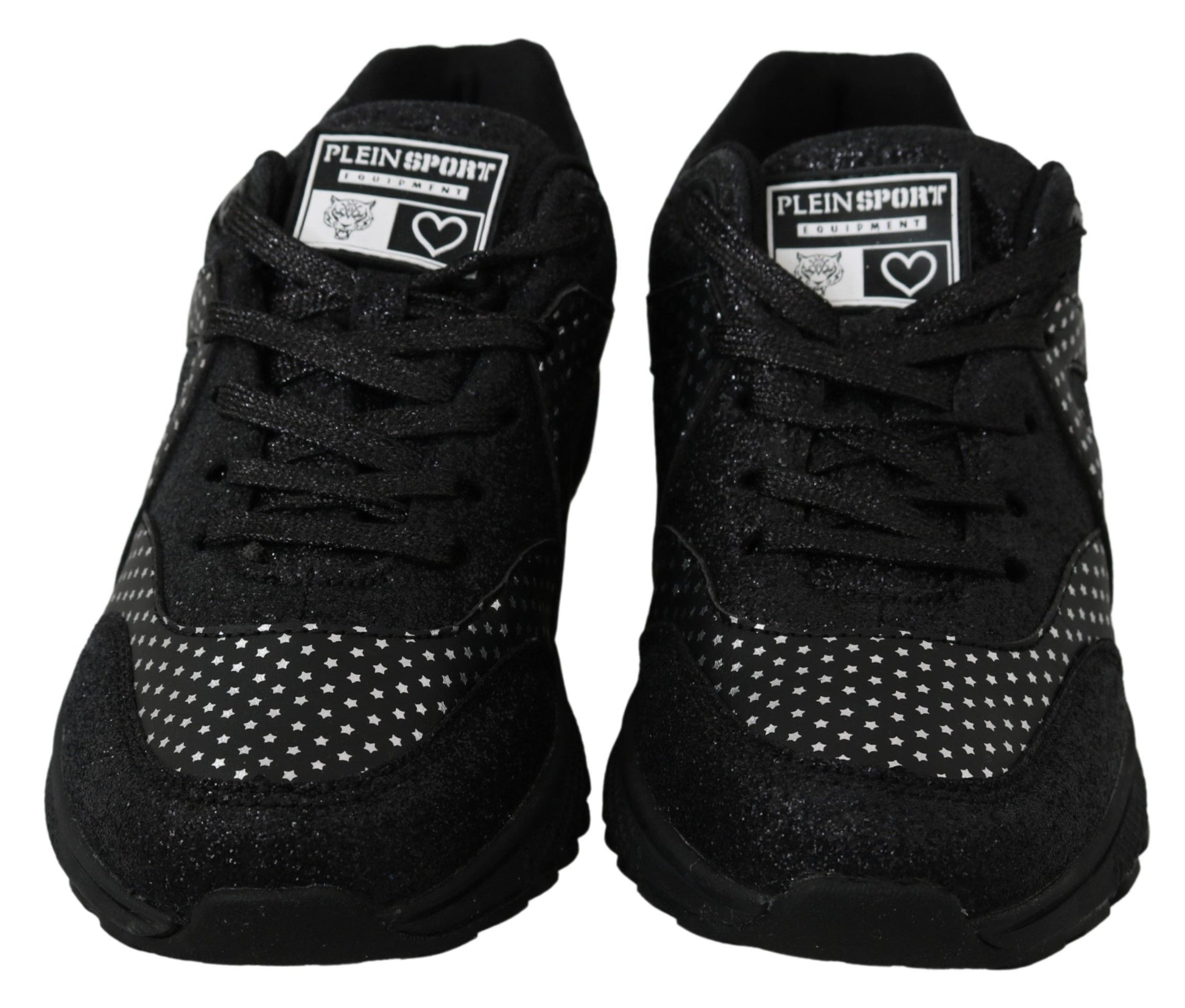 Pair of black sneakers with white soles and a logo on the tongue