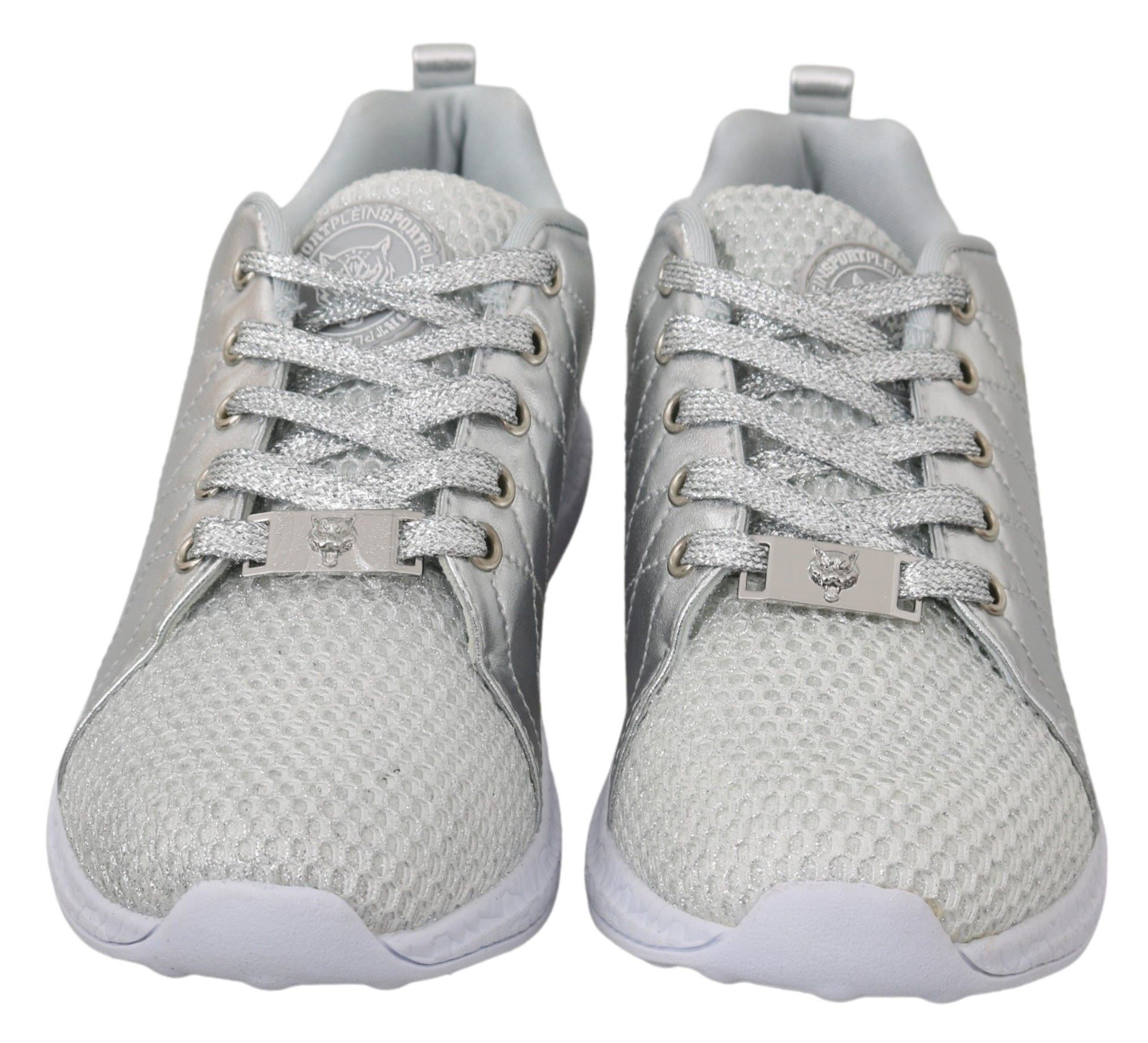 Pair of silver sneakers with laces