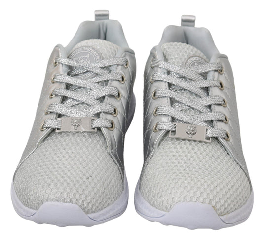 Pair of silver sneakers with laces