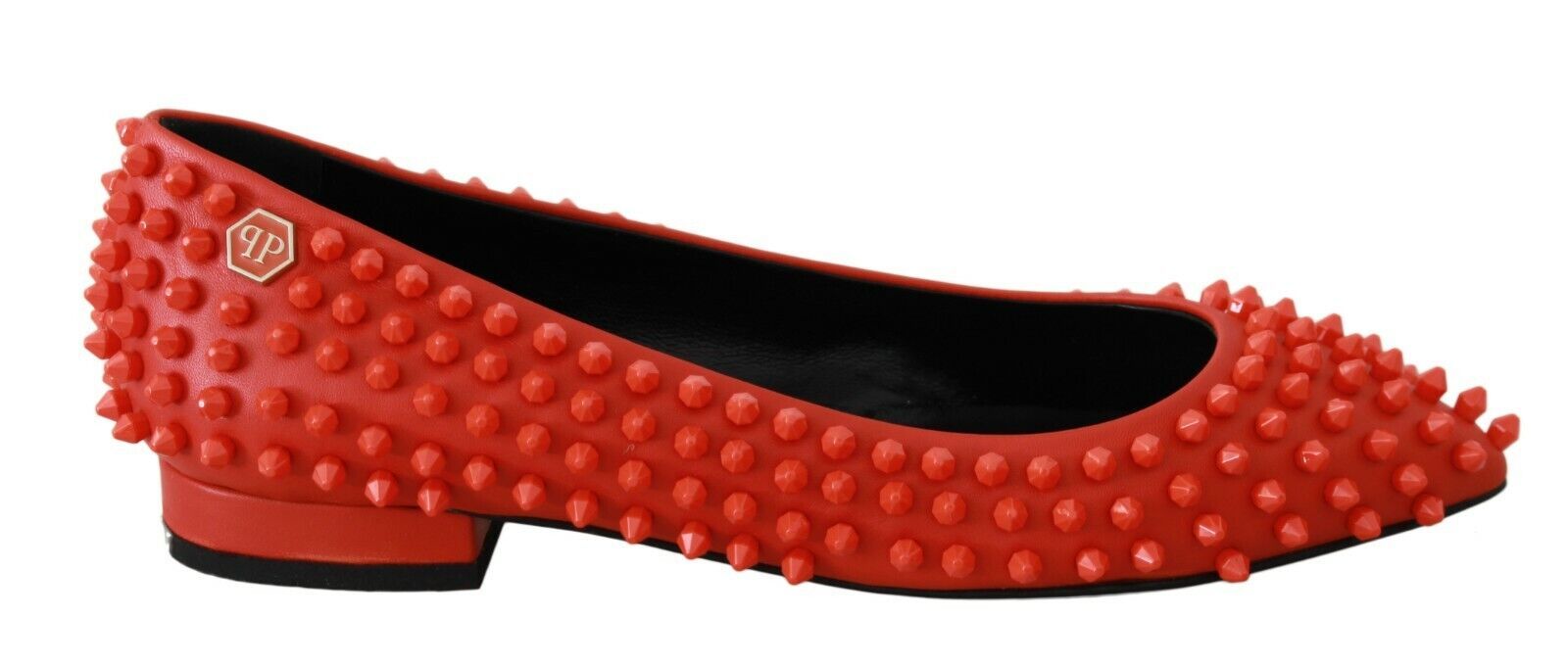 Red shoe with spikes on bottom