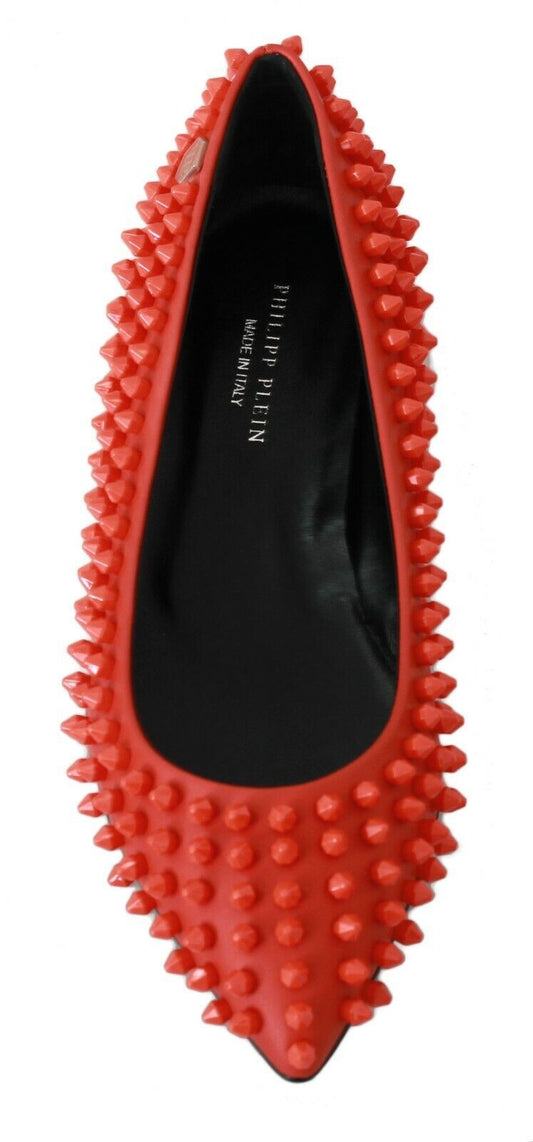 Red high heel shoe with spiky studs on top