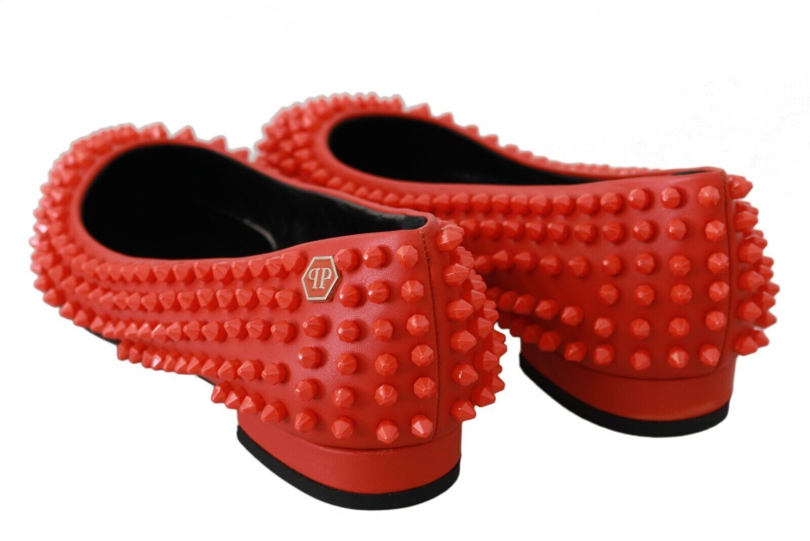 Red shoes with red studs on top