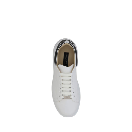 A pair of white sneakers with black laces, featuring a low top and calf leather material