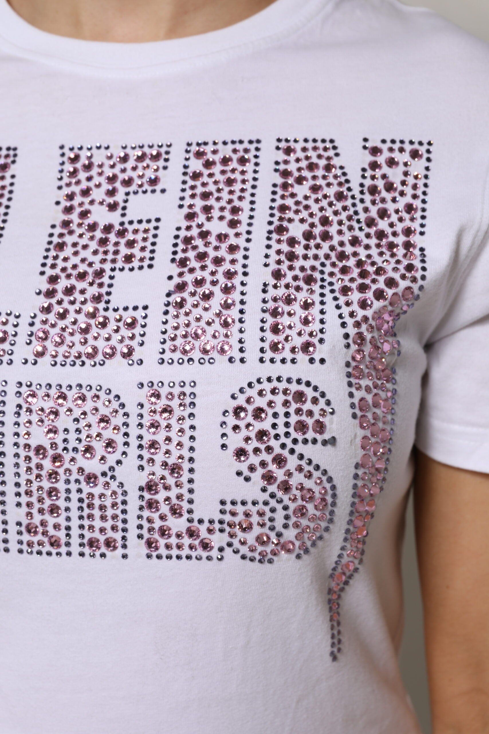White t-shirt with glittery lettering