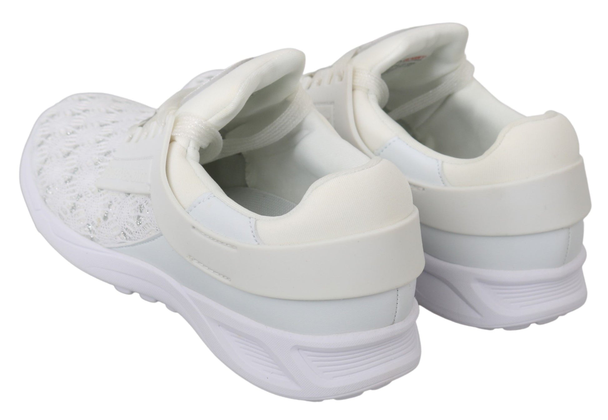 Pair of white sneakers with a knit upper and rubber sole