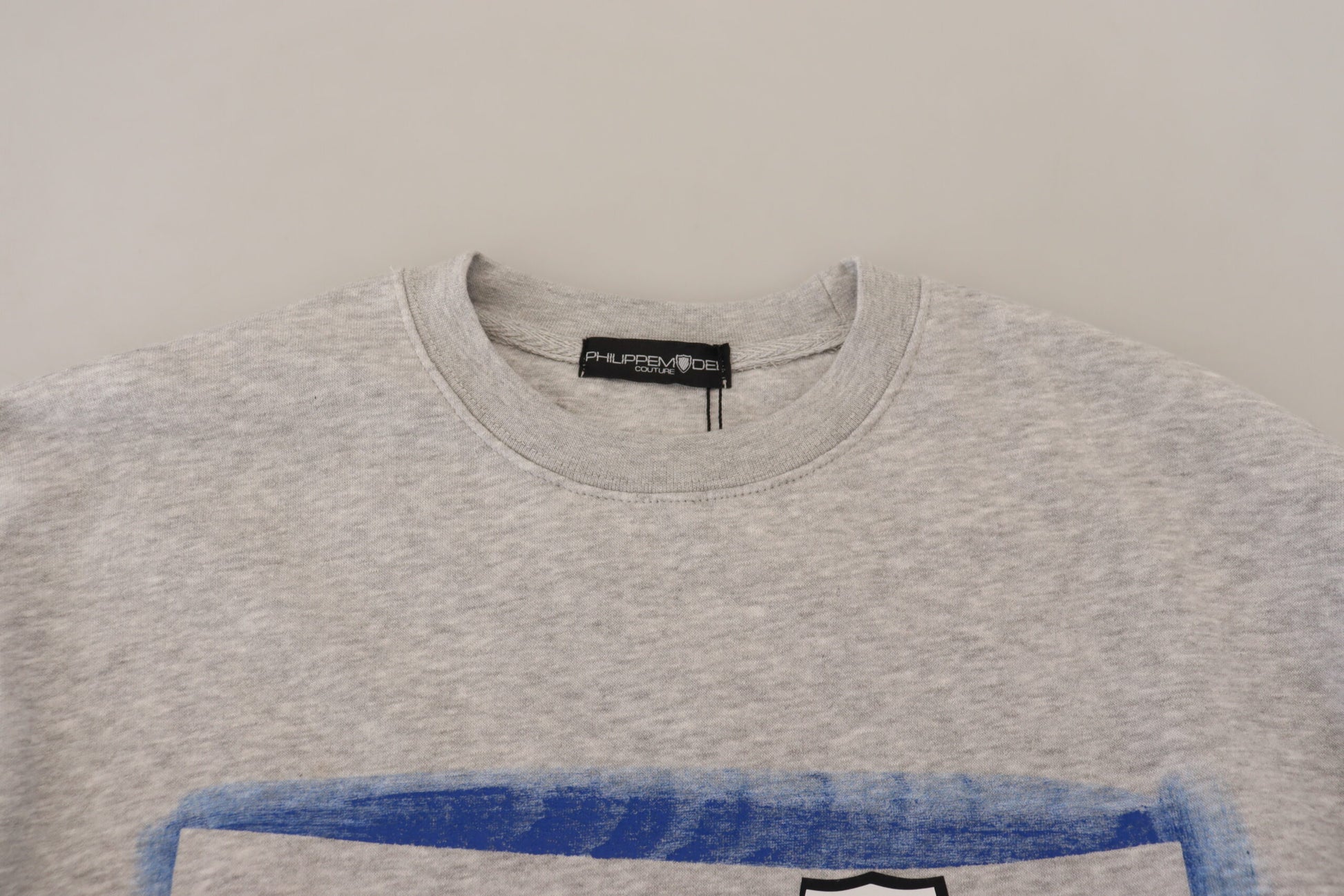 Grey sweatshirt with blue stripe on sleeve