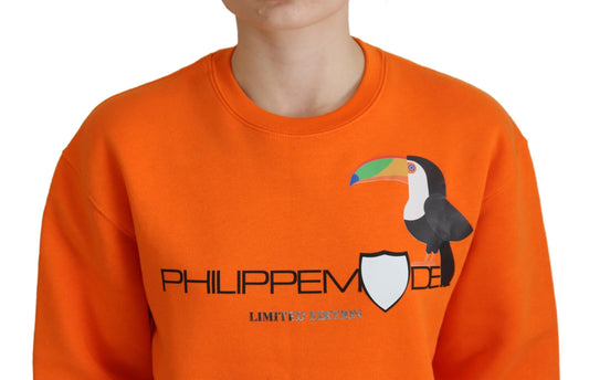 Orange sweatshirt with penguin graphic on front