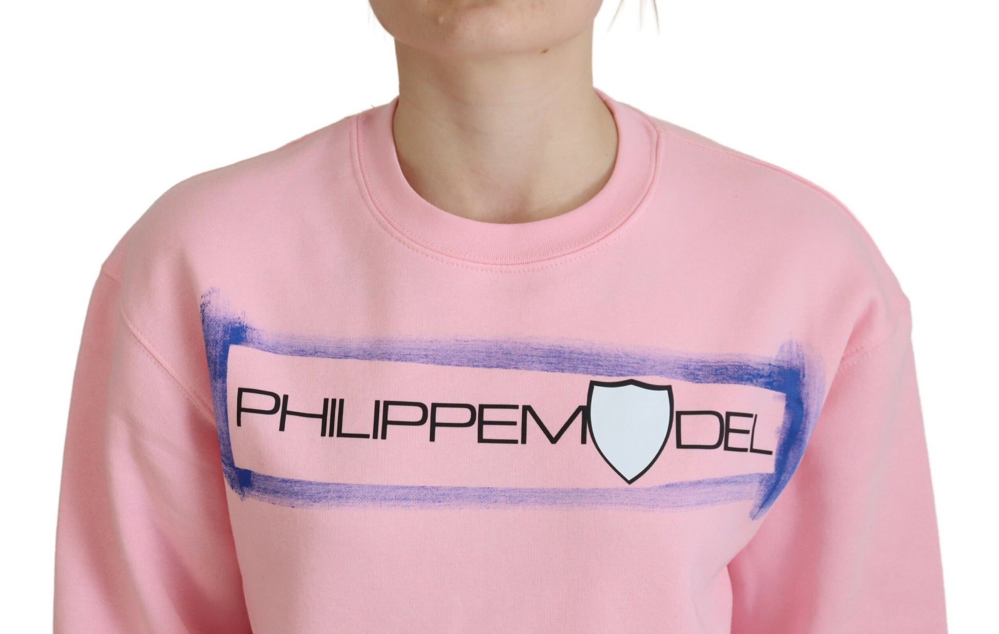 Pink sweatshirt with white lettering and logo