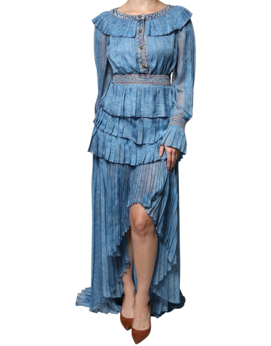 A long blue layered dress with ruffled sleeves and hem