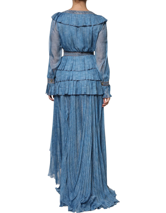 A long blue layered dress with ruffled sleeves