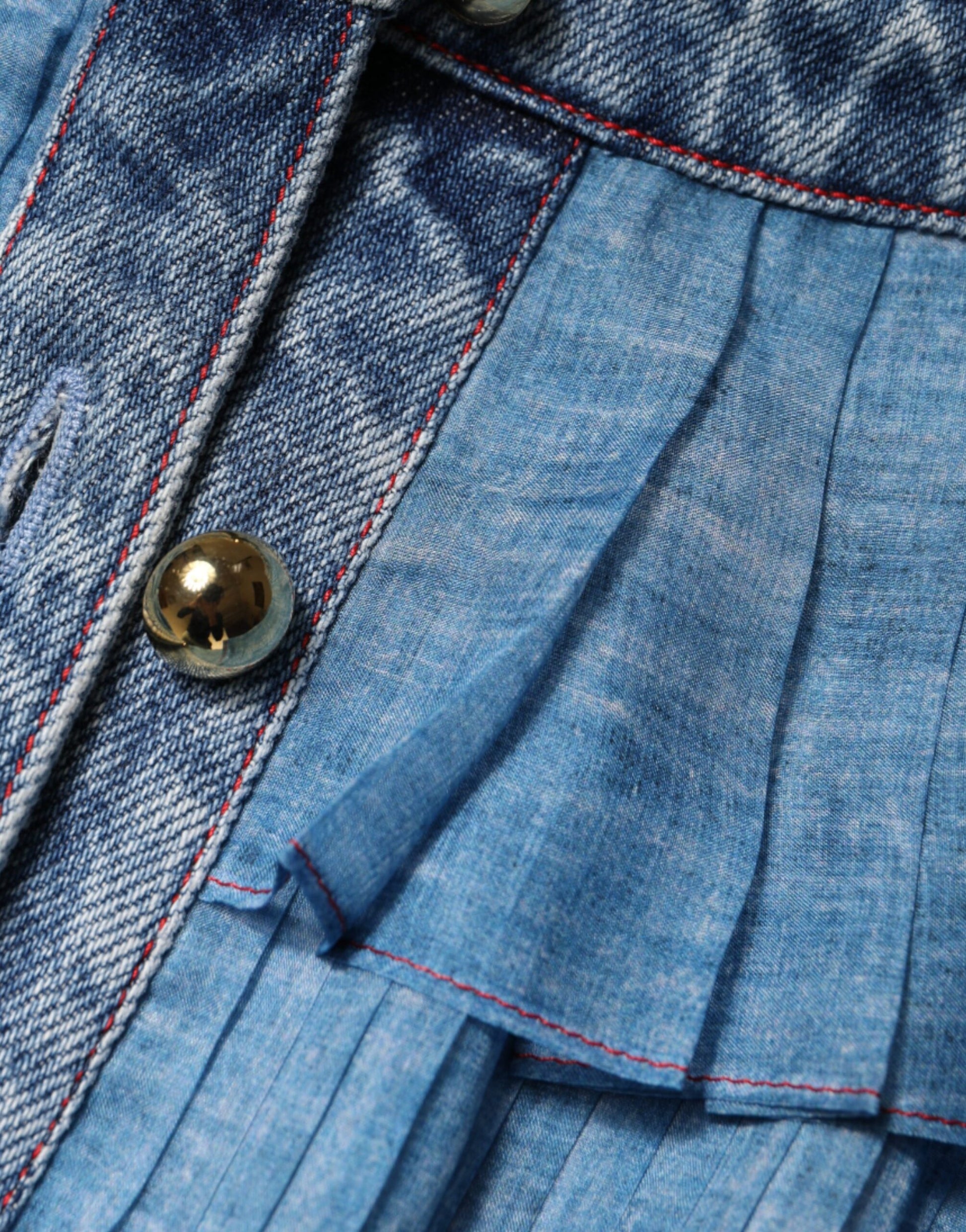 A blue denim dress with layered ruffles on sleeves and hem