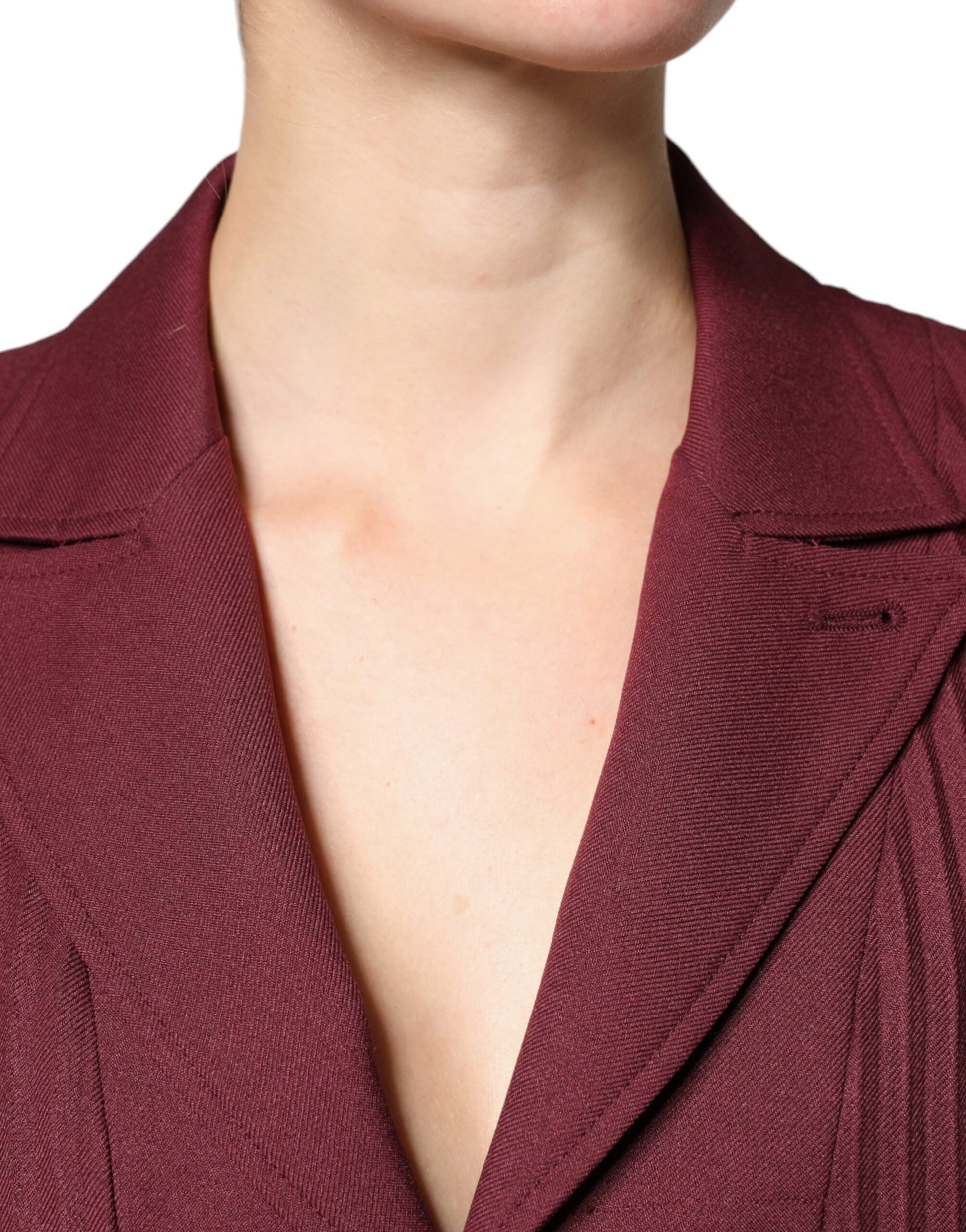 A maroon belted button down dress with a V-neckline