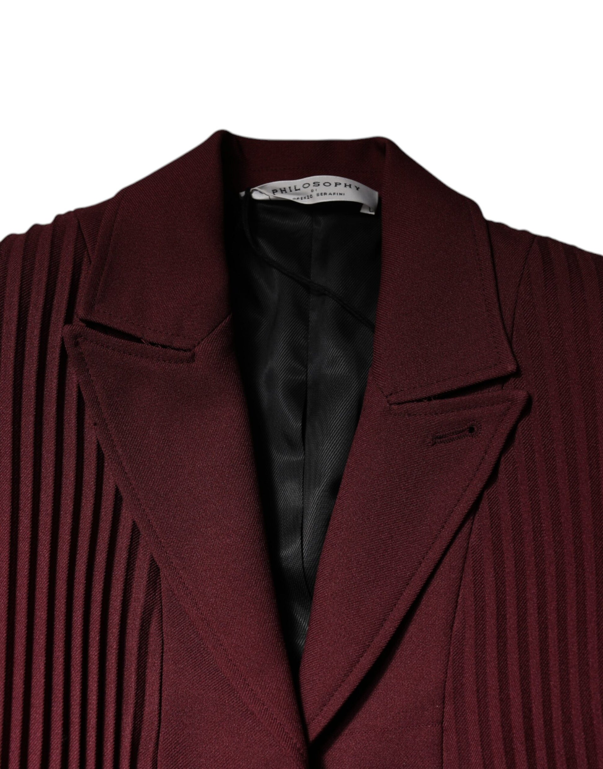 A maroon belted button down dress with a textured fabric