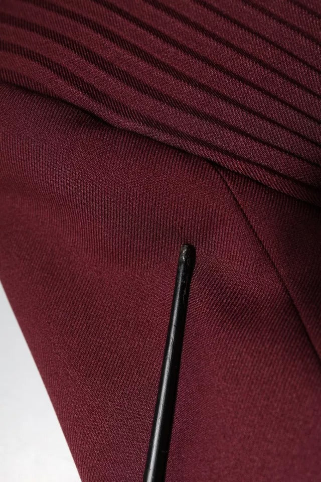 Black pen on maroon button down dress