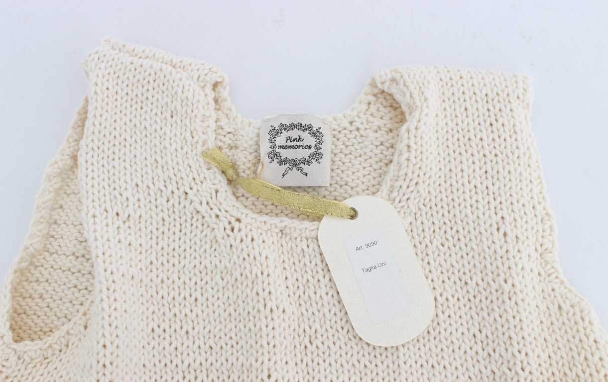 Knitted baby sweater with gold ribbon