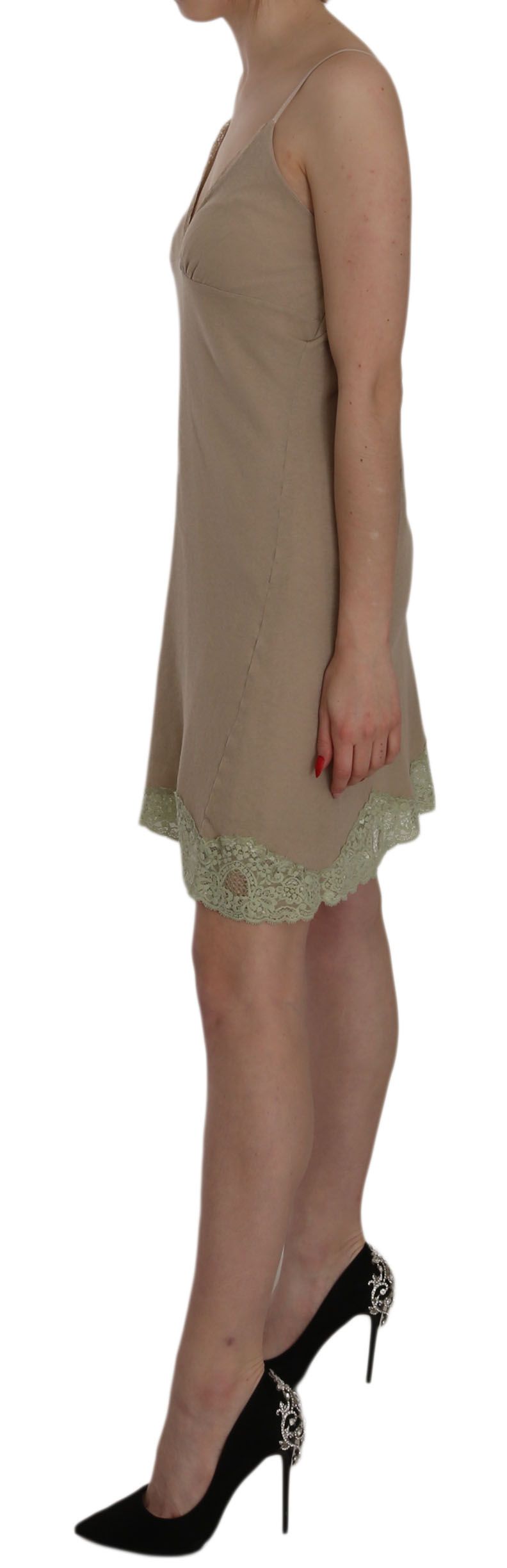 A beige lace spaghetti strap mini cotton dress