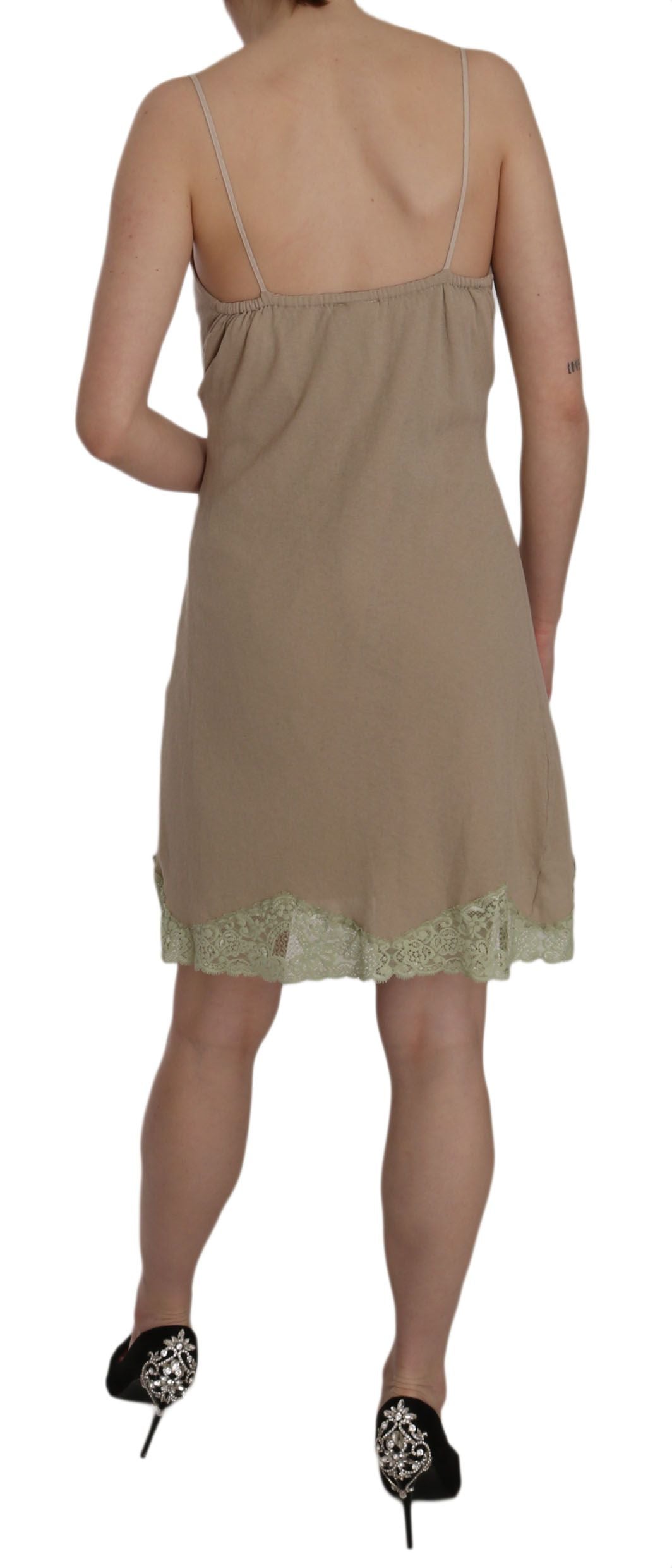 A beige lace spaghetti strap mini cotton dress