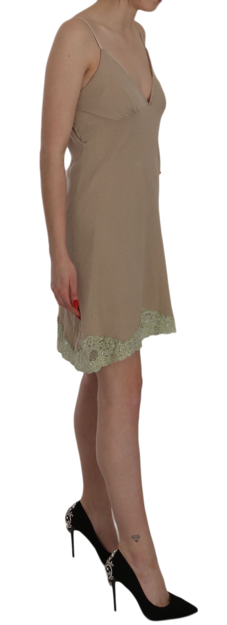 A beige lace spaghetti strap mini cotton dress