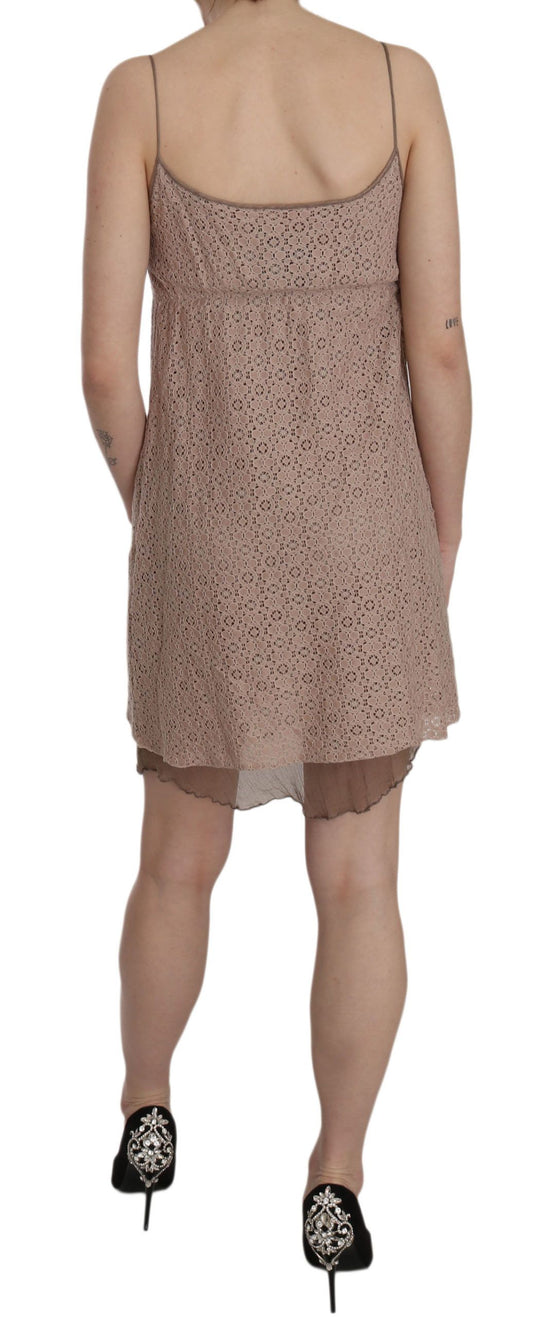 A beige spaghetti strap dress with a lace pattern