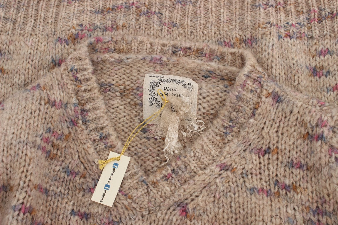 Knitted sweater on hanger with tag