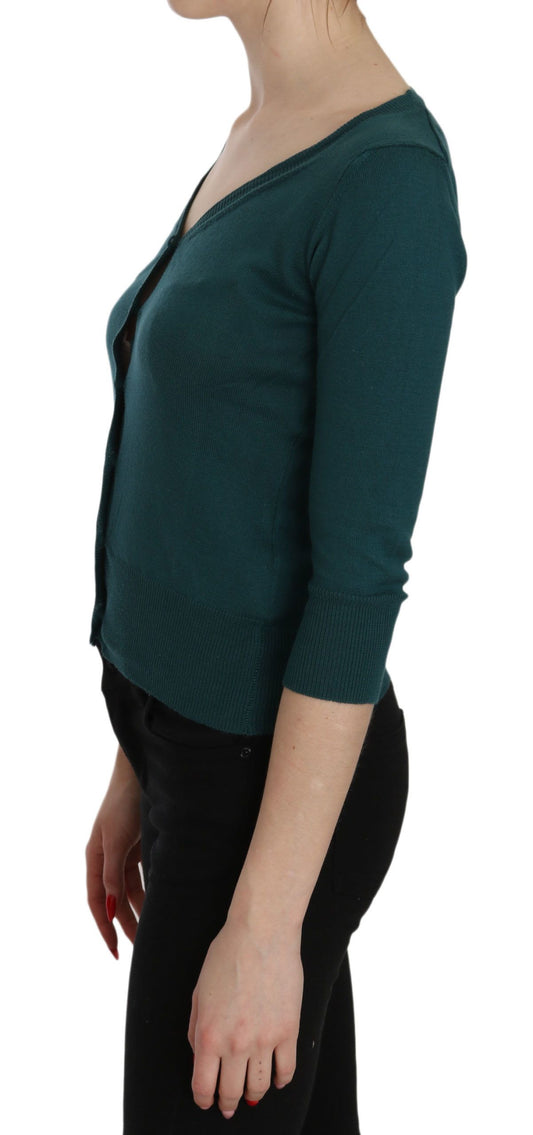 Woman wearing a dark green sweater