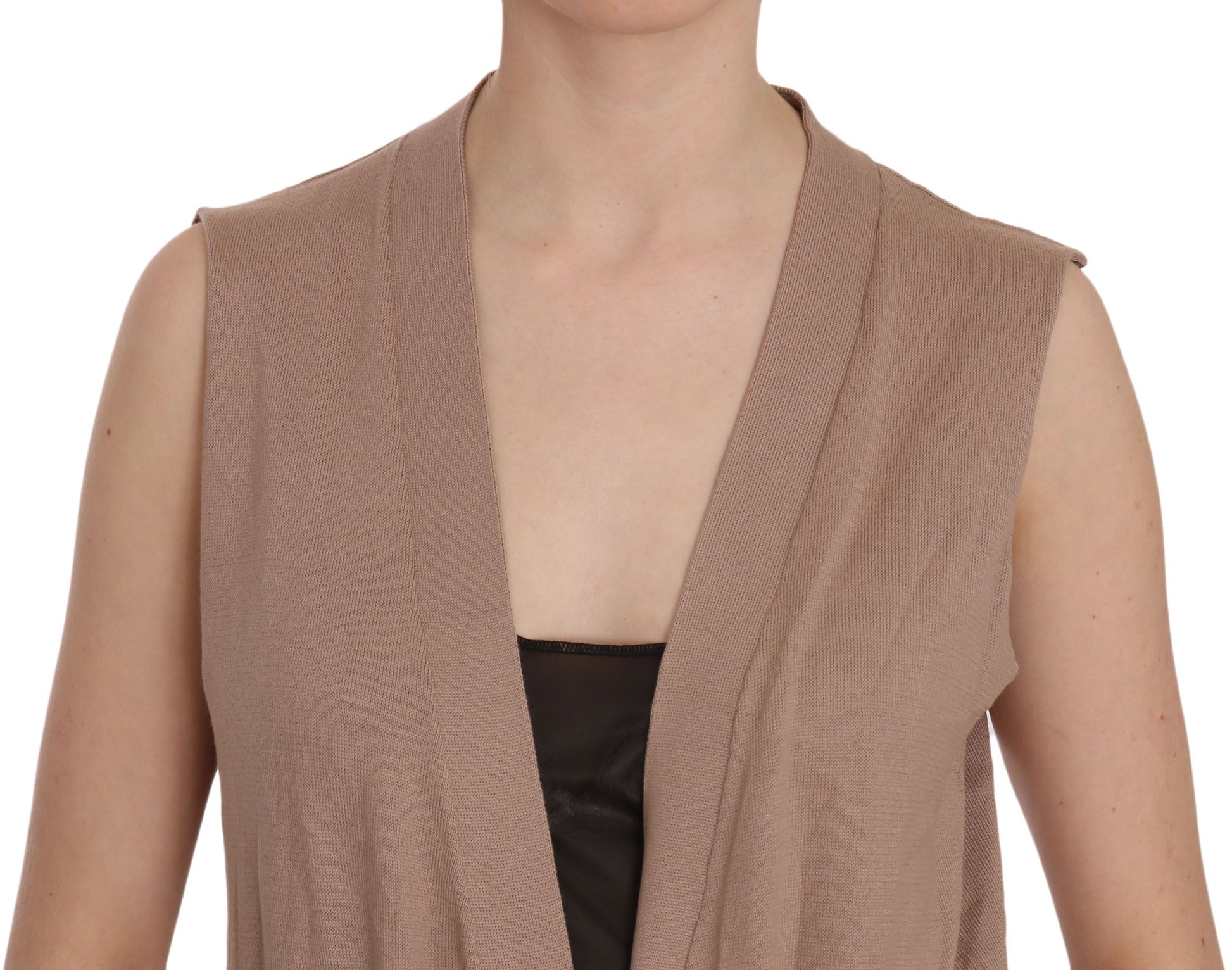 Brown vest over black top