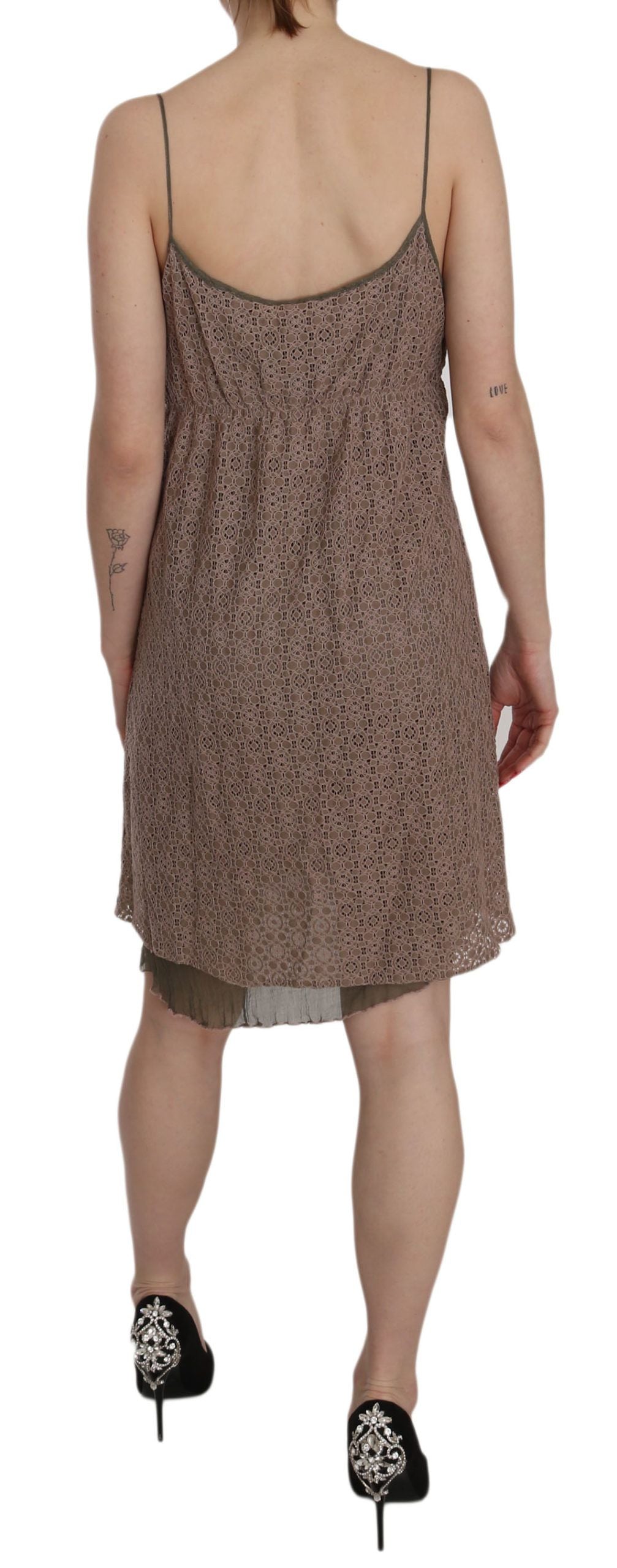 A-line mini dress with spaghetti straps and a pink floral pattern