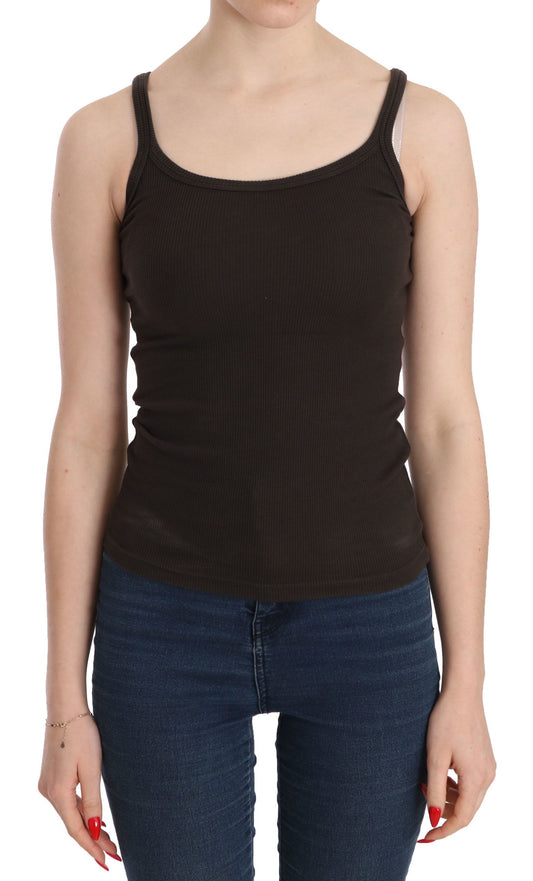 Woman wearing black tank top and blue jeans