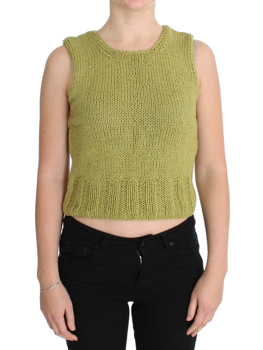 Green crocheted top on woman