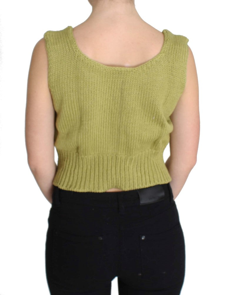 Yellow crocheted vest worn by woman