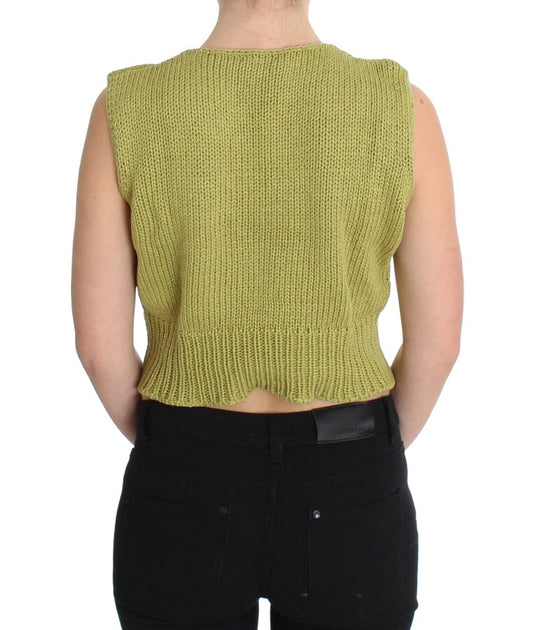 Yellow crocheted vest worn by woman