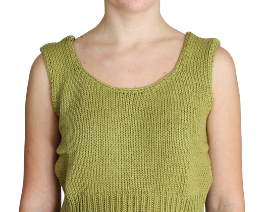 Green knitted vest on woman's shoulders
