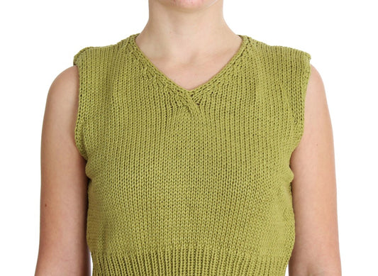 Green crocheted vest on woman's shoulders