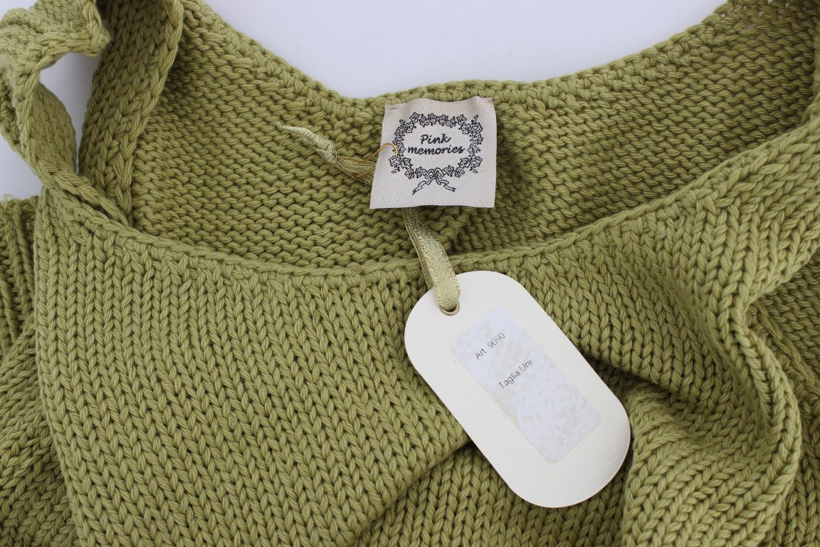 Green knitted sweater on a mannequin