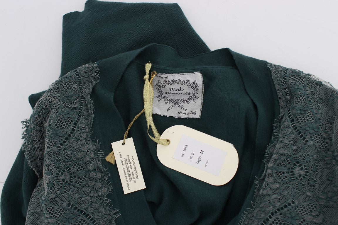 Green lace garment with tag attached to neckline